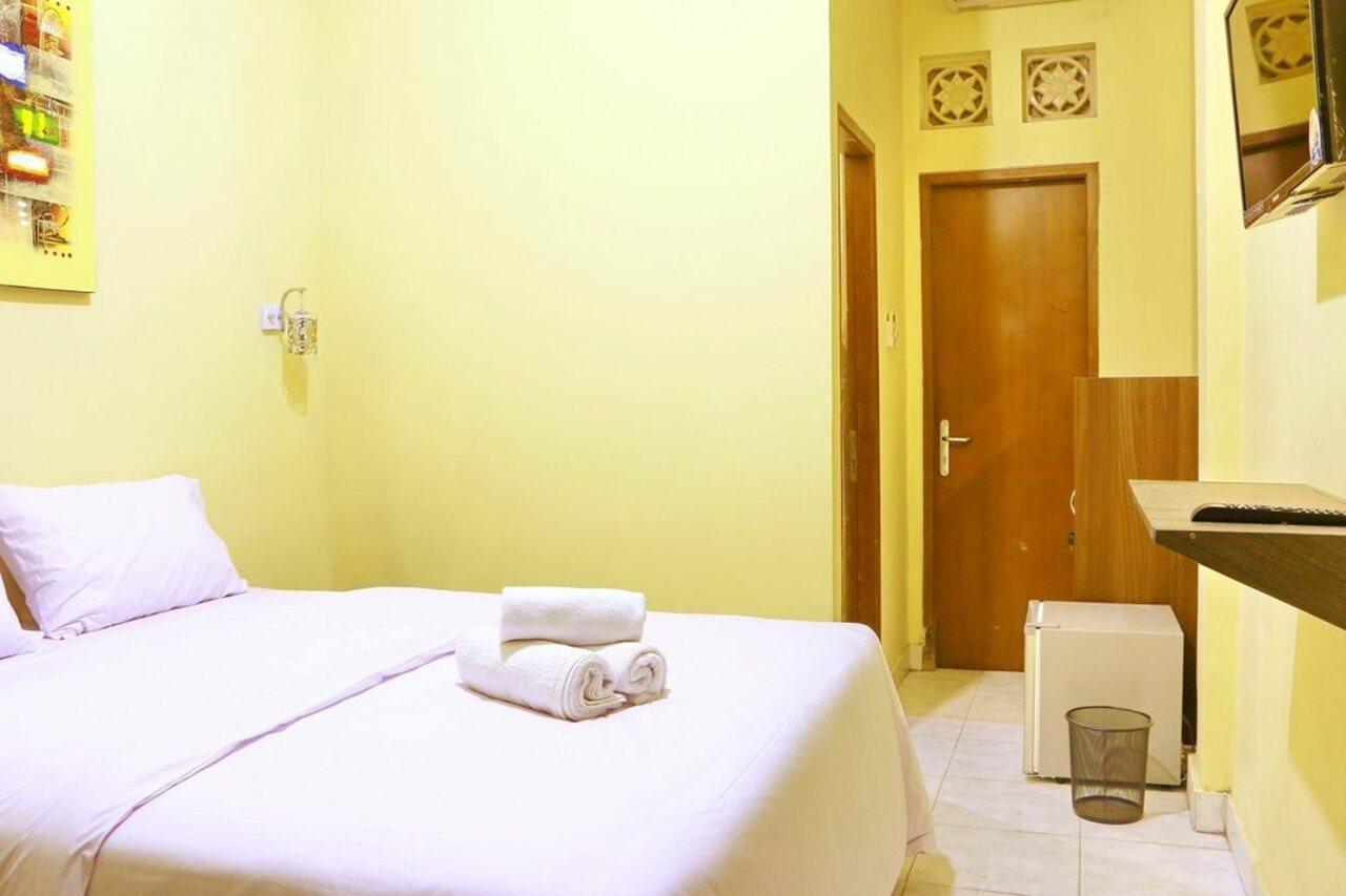 RedDoorz @ Rabasta Kuta Residence Bagian luar foto